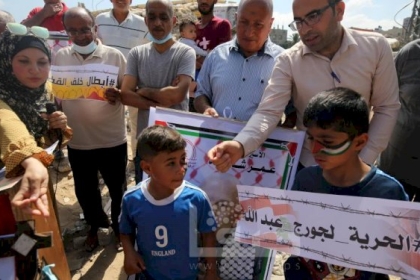 وقفة تضامنية مع الأطفال المهدمة بيوتهم والأسرى شمالي القطاع