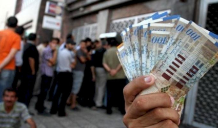 مساعٍ لصرف 50% من رواتب الموظفين