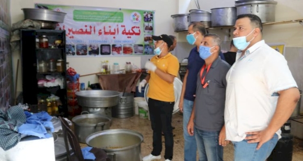 حركة فتح محافظة الوسطى توزع  وجبات غذائية على الأسر المتعففة بمخيم النصيرات